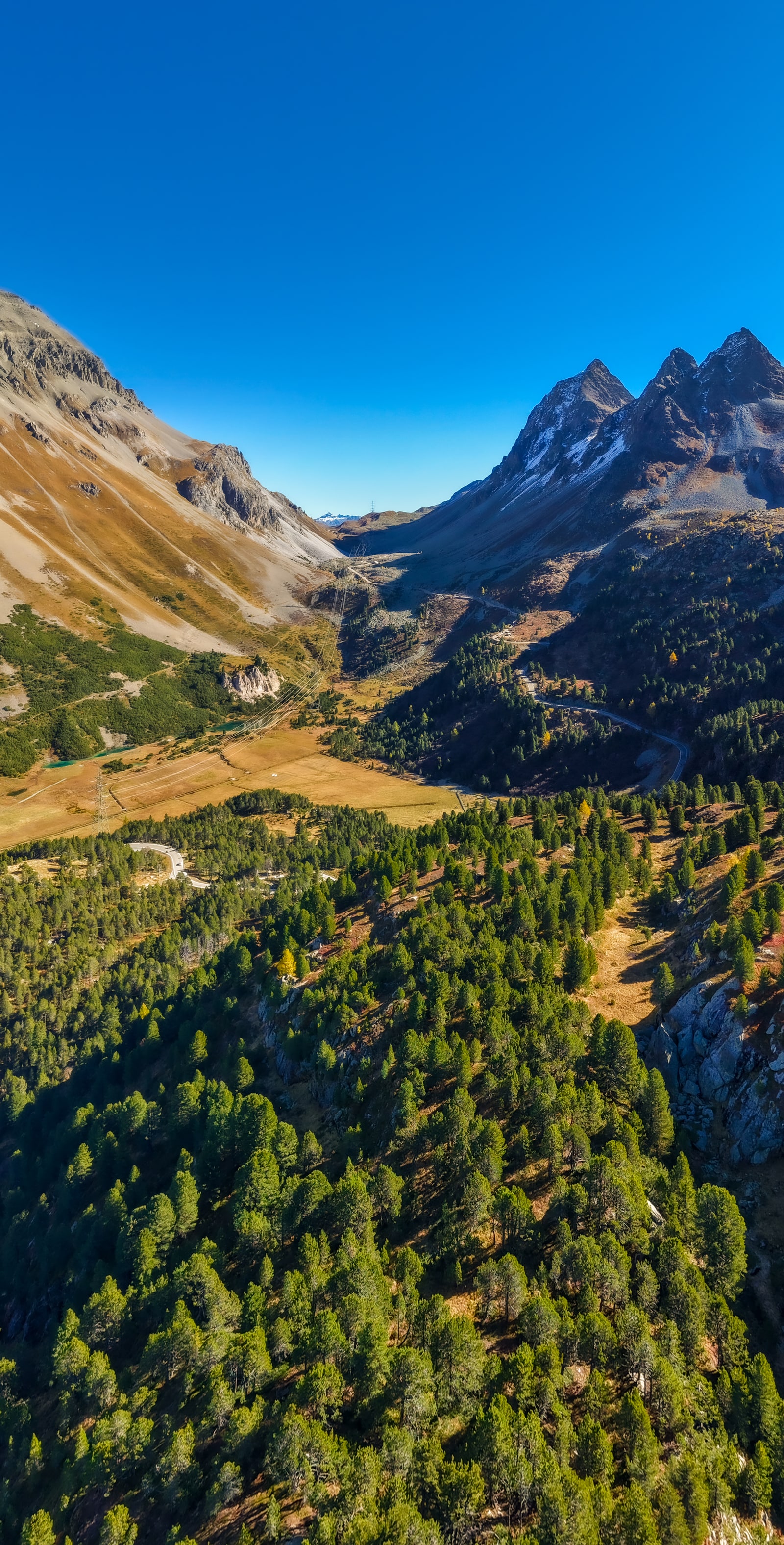 Signature drone photography shot showcasing the story-telling power of aerial perspectives over Swiss natural landscapes
