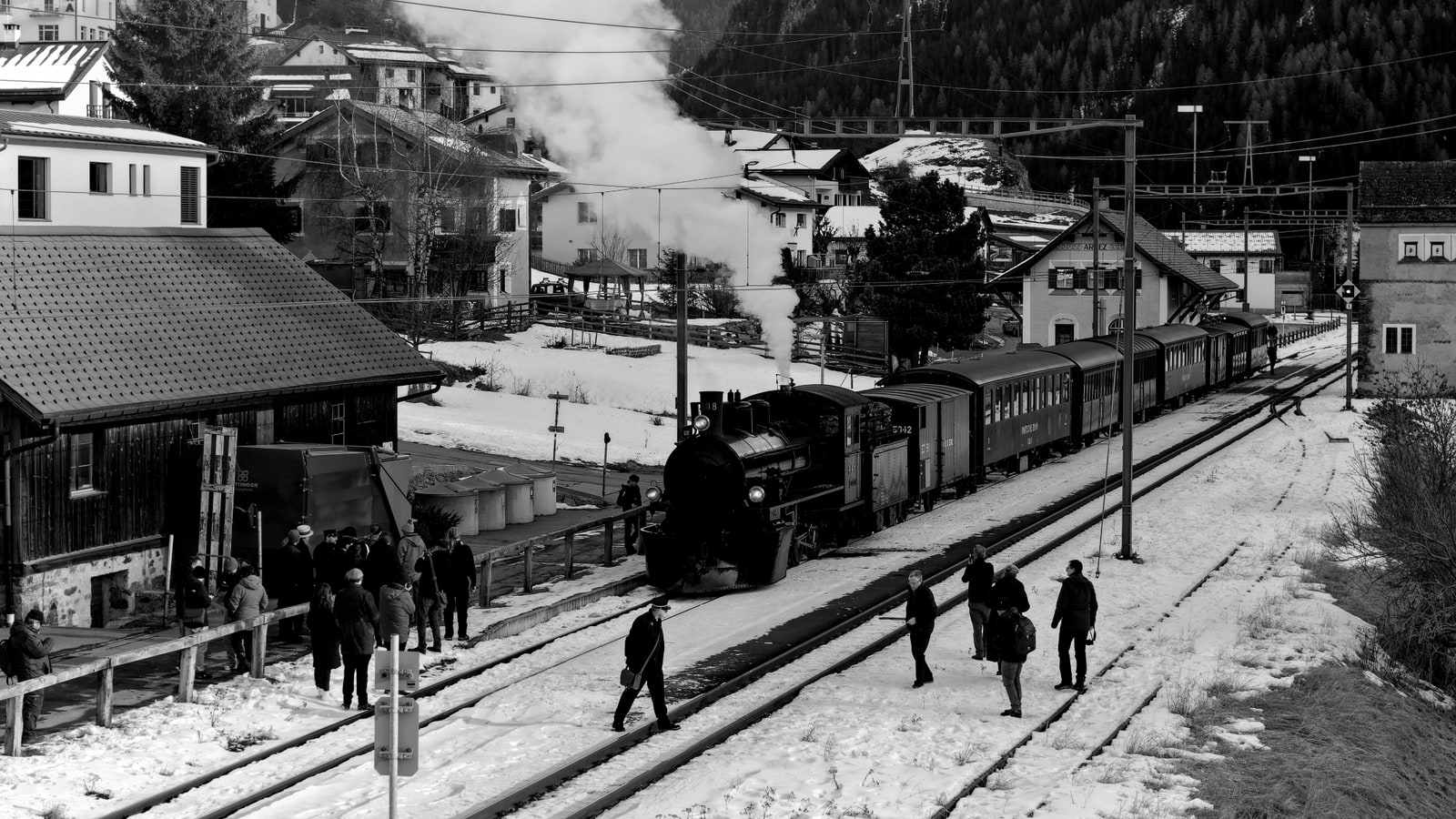 Breathtaking aerial winter landscape with snow-covered alpine terrain and dramatic mountain formations in Switzerland